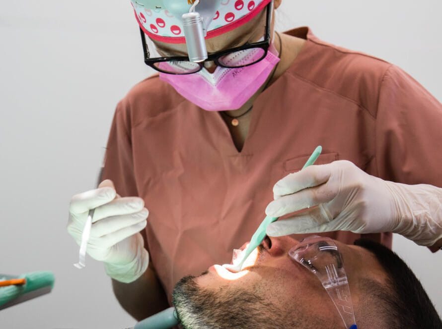 dental cleaning with airflow in SDS Dental Clinic